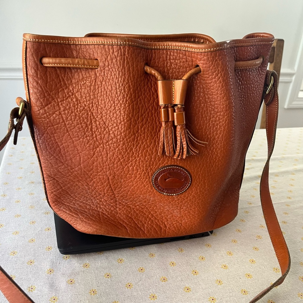 Vintage Dooney & Bourke British tan 10 inches tall 14 inches wide